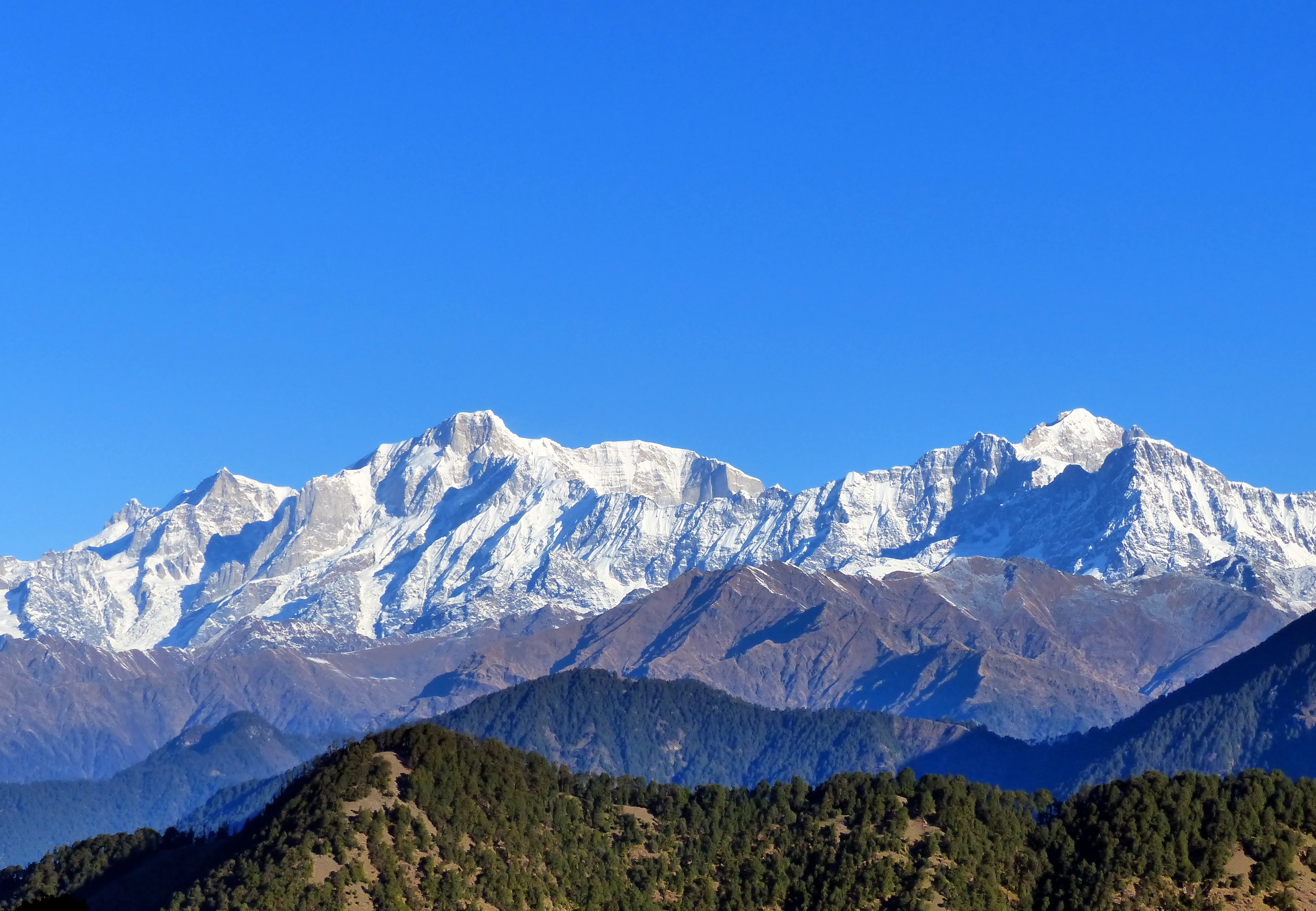 Snow-capped Himalayan peaks — premium journeys across India and beyond