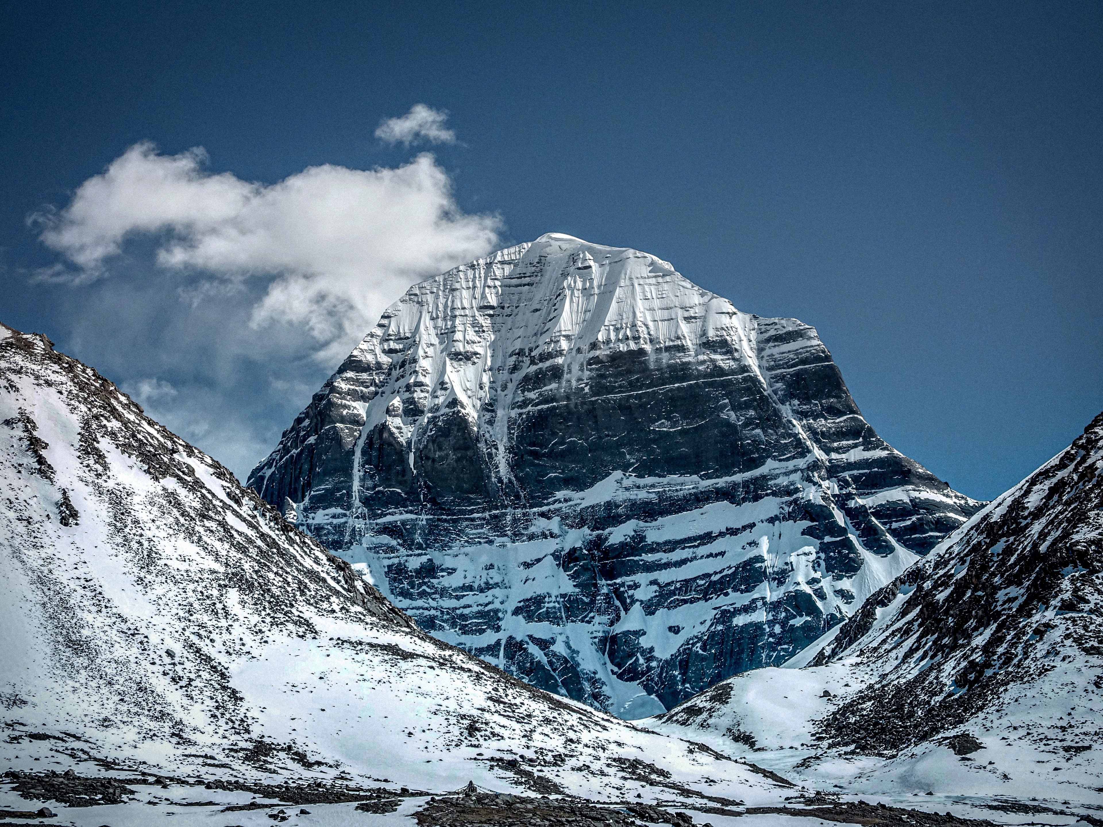 Mount Kailash peak rising majestically against a dark sky